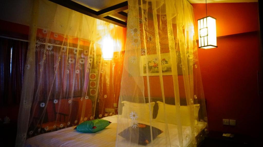 Lijiang Wangjia Courtyard Inn Pokoj fotografie