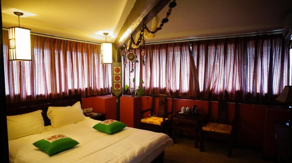 Lijiang Wangjia Courtyard Inn Pokoj fotografie